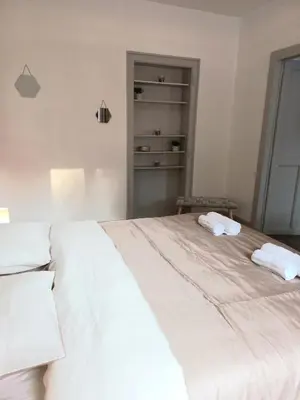Un ou plusieurs lits dans un hébergement de l'établissement Appartement Les Iris, au calme, proche du centre