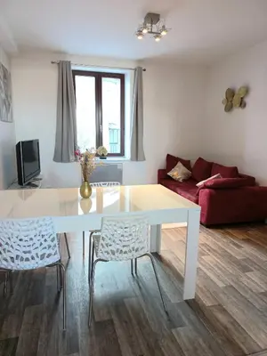 Coin salon dans l'établissement Appartement Les Iris, au calme, proche du centre