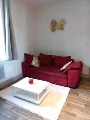 Coin salon dans l'établissement Appartement Les Iris, au calme, proche du centre