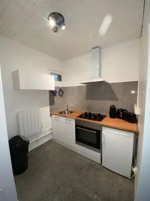 Cuisine ou kitchenette dans l'établissement Villa sans soucis