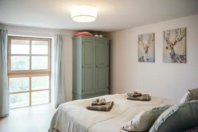 Un ou plusieurs lits dans un hébergement de l'établissement Villa d'exception LA BELLE DES VOSGES 4 étoiles, bain nordique, sauna, billard etc