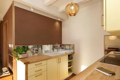 Cuisine ou kitchenette dans l'établissement Duplex Fa7 - Duplex éco-rénové