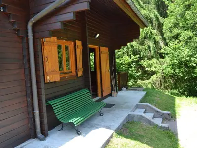 Jardin de l'établissement Le Chant de la Rivière - Chalet 3 étoiles pour 8 personnes