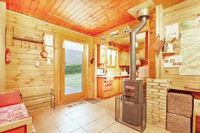 Cuisine ou kitchenette dans l'établissement Le Chant de la Rivière - Chalet 3 étoiles pour 8 personnes
