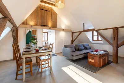 Coin salon dans l'établissement Chabi Chalet Gîte au coeur d'Eguisheim