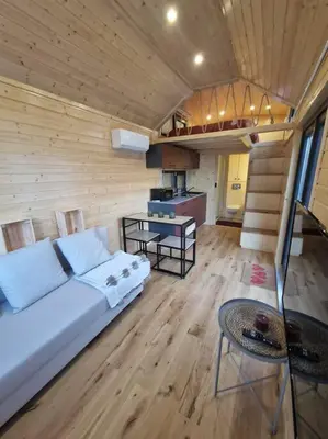 Coin salon dans l'établissement Magnifique petite maison
