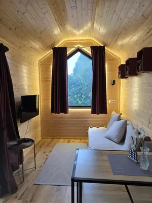 Télévision ou salle de divertissement dans l'établissement Magnifique petite maison