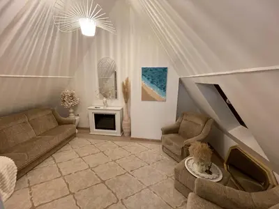 Coin salon dans l'établissement Superbe villa à 2 km centre ville de Colmar