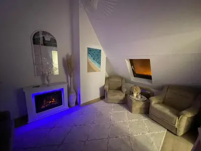 Coin salon dans l'établissement Superbe villa à 2 km centre ville de Colmar