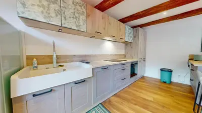 Cuisine ou kitchenette dans l'établissement La Renaissance Moderne