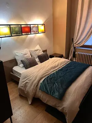 Un ou plusieurs lits dans un hébergement de l'établissement cozy