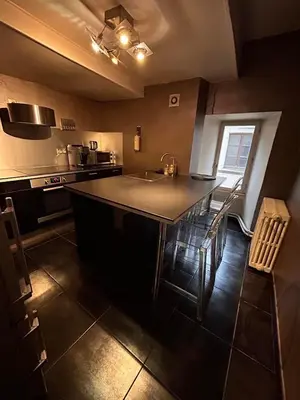 Cuisine ou kitchenette dans l'établissement cozy