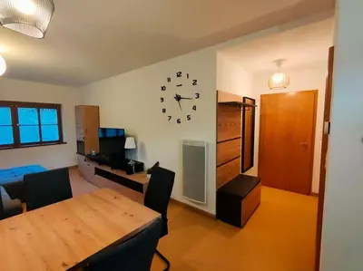 Télévision ou salle de divertissement dans l'établissement Industriel F3 Appartement