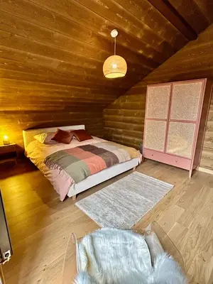 Un ou plusieurs lits dans un hébergement de l'établissement Chalet PRALIN