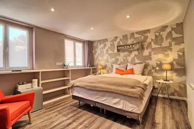 Un ou plusieurs lits dans un hébergement de l'établissement La Grande Ourse - Chambre cosy 2 pers - L'Alcôve de l'Ours