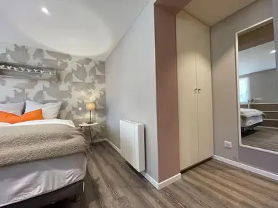 Un ou plusieurs lits dans un hébergement de l'établissement La Grande Ourse - Chambre cosy 2 pers - L'Alcôve de l'Ours