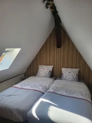 Un ou plusieurs lits dans un hébergement de l'établissement Au cœur du Val d'argent Duplex atypique à Sainte-Marie-aux-Mines
