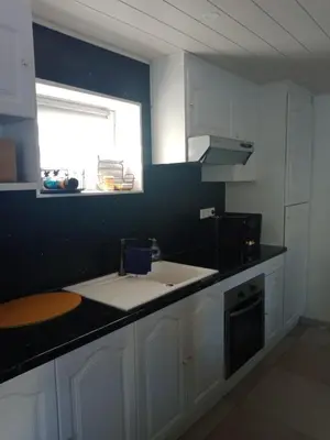 Cuisine ou kitchenette dans l'établissement Le petit Berger