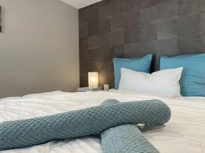 Un ou plusieurs lits dans un hébergement de l'établissement La Tanière de l'Ours - L'Alcôve de l'Ours - Chambre cosy 2 pers