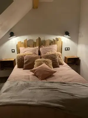 Un ou plusieurs lits dans un hébergement de l'établissement Als AS DE COEUR La maison aux mille et un coeurs