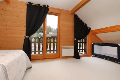 Un ou plusieurs lits dans un hébergement de l'établissement Le Chalet du Lac - Dans un environnement idéal