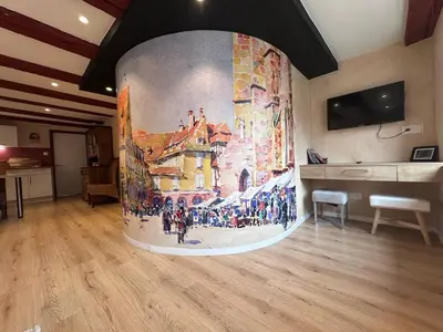 Télévision ou salle de divertissement dans l'établissement B'm Yerri - Centre ville - vue Cathédrale