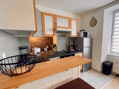 Cuisine ou kitchenette dans l'établissement Joli appartement avec parking