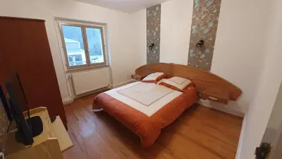 Un ou plusieurs lits dans un hébergement de l'établissement GITE LE HOLWECK Gérardmer