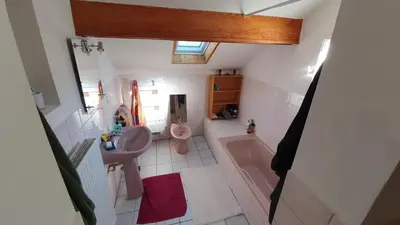Coin salon dans l'établissement GITE LE HOLWECK Gérardmer