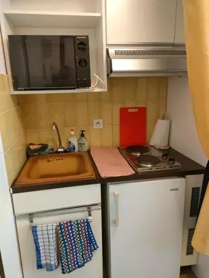 Cuisine ou kitchenette dans l'établissement Un temps pour vous