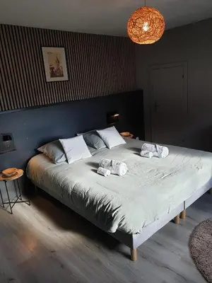 Un ou plusieurs lits dans un hébergement de l'établissement Happiness Cottage