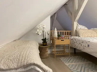 Un ou plusieurs lits dans un hébergement de l'établissement DUPLEX SPACIEUX TOUT CONFORT