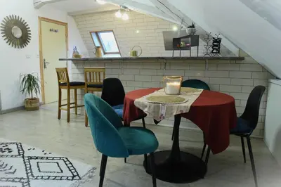 Coin salon dans l'établissement DUPLEX SPACIEUX TOUT CONFORT