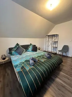 Un ou plusieurs lits dans un hébergement de l'établissement Appartement Algo