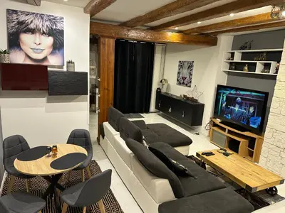 Télévision ou salle de divertissement dans l'établissement L 'étape68