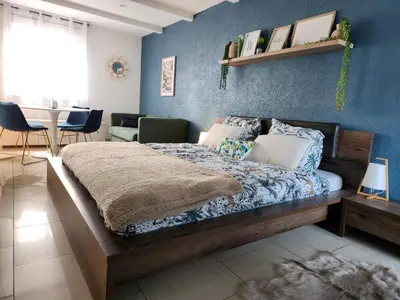 Un ou plusieurs lits dans un hébergement de l'établissement Maison 5 chambres proche Basel Germany