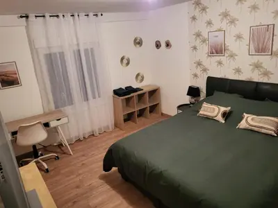 Un ou plusieurs lits dans un hébergement de l'établissement Maison 5 chambres proche Basel Germany