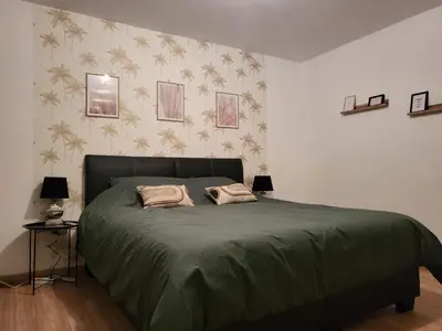 Un ou plusieurs lits dans un hébergement de l'établissement Maison 5 chambres proche Basel Germany