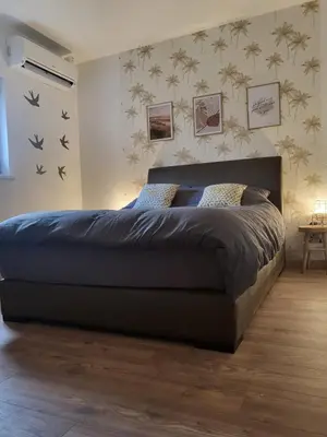 Un ou plusieurs lits dans un hébergement de l'établissement Maison 5 chambres proche Basel Germany