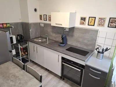 Cuisine ou kitchenette dans l'établissement Urban Green Spirit - Centre historique, familial