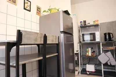 Cuisine ou kitchenette dans l'établissement Urban Green Spirit - Centre historique, familial