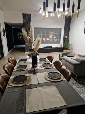 Coin salon dans l'établissement Maison plain-pied pour 8 personnes