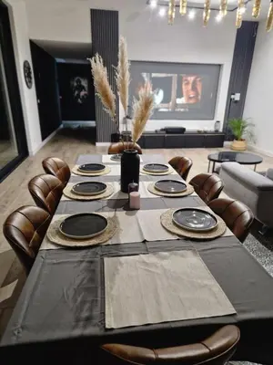 Coin salon dans l'établissement Maison plain-pied pour 8 personnes