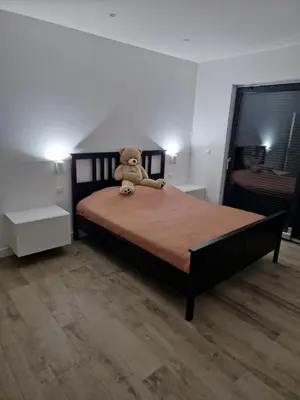Un ou plusieurs lits dans un hébergement de l'établissement Maison plain-pied pour 8 personnes