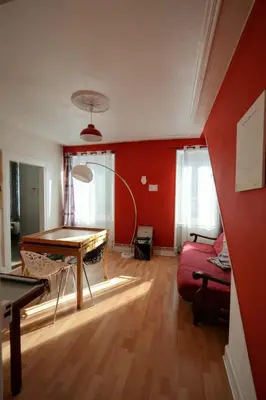 Un ou plusieurs lits dans un hébergement de l'établissement Appartement de caractère