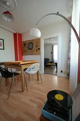 Coin salon dans l'établissement Appartement de caractère