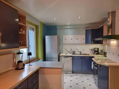 Cuisine ou kitchenette dans l'établissement La Maison Chamarrée