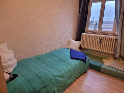 Un ou plusieurs lits dans un hébergement de l'établissement La Maison Chamarrée