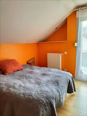 Un ou plusieurs lits dans un hébergement de l'établissement Apparemment 3 chambres