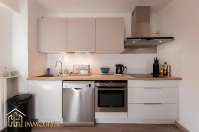 Cuisine ou kitchenette dans l'établissement Les Jonquilles - Colmar